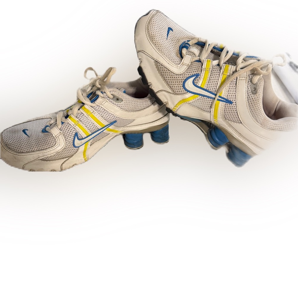 Nike Women’s Shox White With Blue and Yellow. Size 6